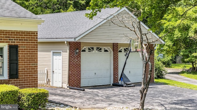 1559 Washington Ln, West Chester, PA 19382 - garage featuring asphalt driveway