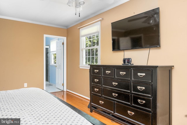 1559 Washington Ln, West Chester, PA 19382 - bedroom with wood finished floors, crown molding, and ensuite bathroom
