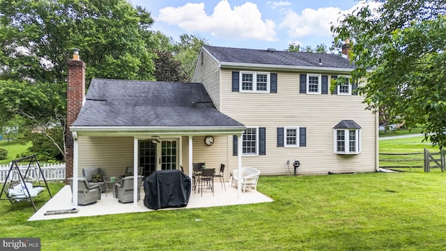 1559 Washington Ln, West Chester, PA 19382 - rear view of house featuring a chimney and a patio