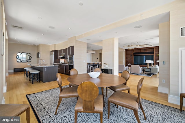 130 S 18th St Unit 3102, Philadelphia, PA 19103 - dining room featuring light wood finished floors and recessed lighting
