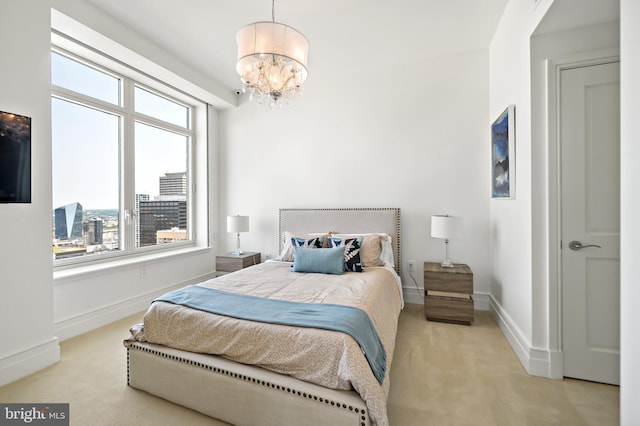 130 S 18th St Unit 3102, Philadelphia, PA 19103 - carpeted bedroom with a chandelier and baseboards