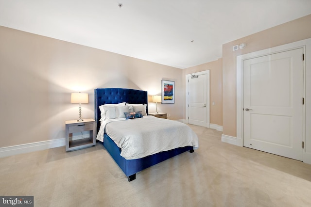 130 S 18th St Unit 3102, Philadelphia, PA 19103 - bedroom with baseboards and light colored carpet
