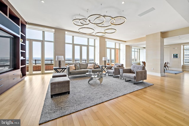 130 S 18th St Unit 3102, Philadelphia, PA 19103 - living area with hardwood / wood-style floors, a chandelier, and recessed lighting