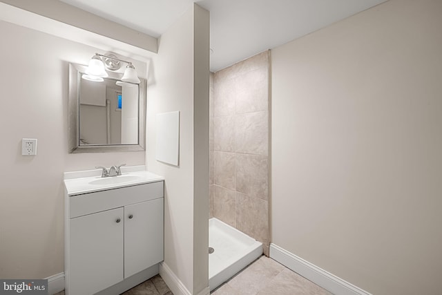 838 Benninghaus Rd, Baltimore, MD 21212 - full bathroom with vanity, a tile shower, and tile patterned flooring