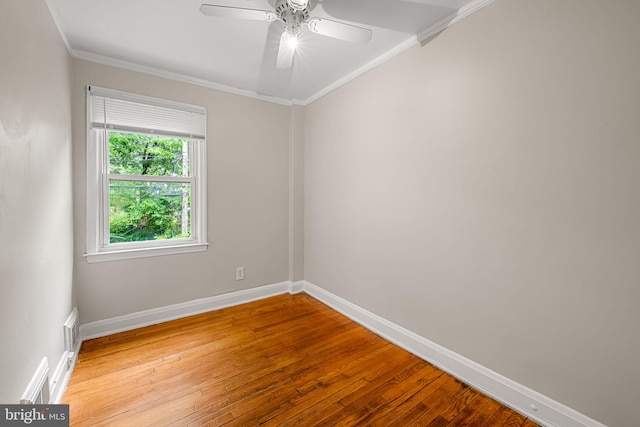 838 Benninghaus Rd, Baltimore, MD 21212 - spare room with crown molding, hardwood / wood-style flooring, and a ceiling fan