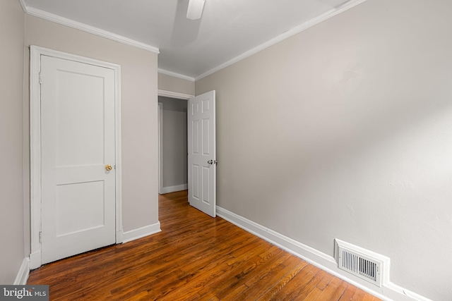 838 Benninghaus Rd, Baltimore, MD 21212 - unfurnished bedroom featuring hardwood / wood-style flooring, ornamental molding, and a ceiling fan