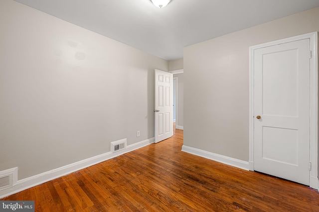 838 Benninghaus Rd, Baltimore, MD 21212 - unfurnished bedroom with baseboards and wood finished floors
