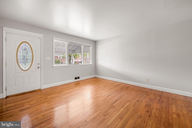 838 Benninghaus Rd, Baltimore, MD 21212 - foyer entrance with light wood-style flooring and baseboards