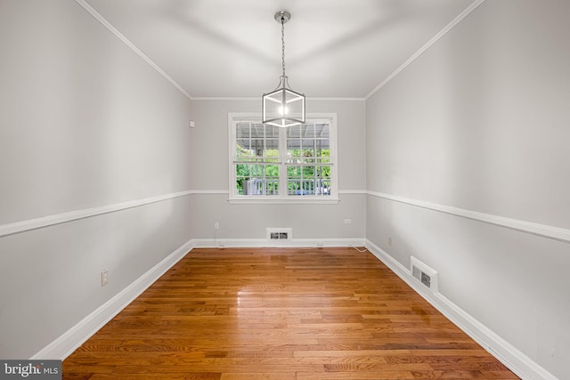 838 Benninghaus Rd, Baltimore, MD 21212 - unfurnished room with wood finished floors and crown molding
