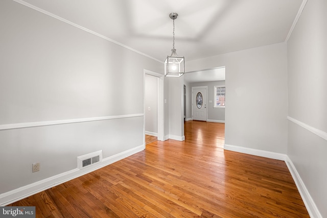 838 Benninghaus Rd, Baltimore, MD 21212 - unfurnished dining area featuring light wood finished floors and ornamental molding