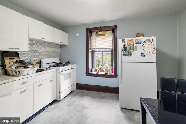1806 Graham Ln, Elkins Park, PA 19027 - kitchen with white appliances, concrete flooring, light countertops, white cabinets, and decorative backsplash