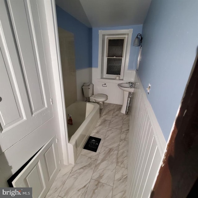1806 Graham Ln, Elkins Park, PA 19027 - full bathroom featuring marble finish flooring, a tub to relax in, and a wainscoted wall