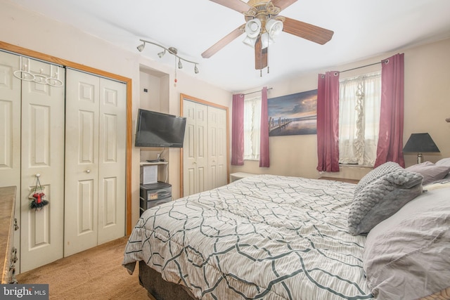 2212 S Bouvier St, Philadelphia, PA 19145 - bedroom featuring carpet, two closets, and ceiling fan