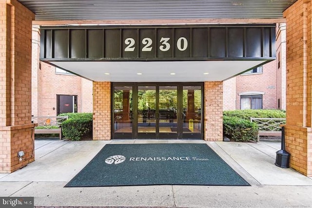 2230 George C Marshall Dr Unit 512, Falls Church, VA 22043 - doorway to property with french doors and brick siding