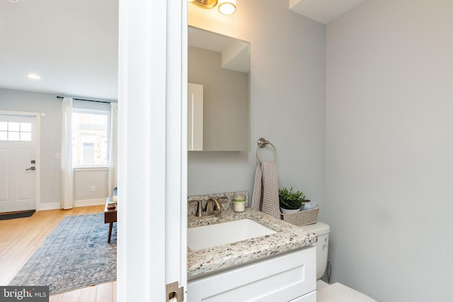 1229 S Bucknell St, Philadelphia, PA 19146 - bathroom with vanity, wood finished floors, and recessed lighting