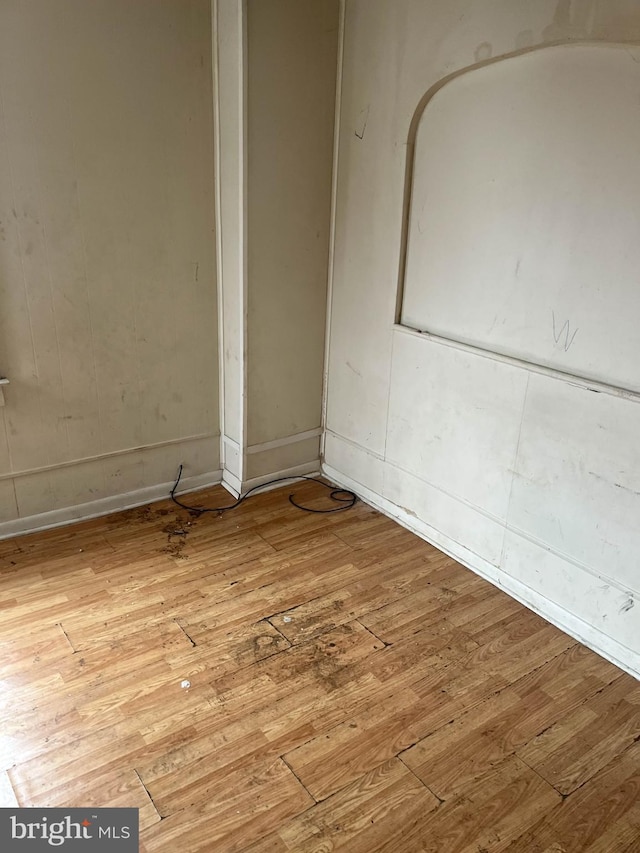 3601 9th St, Baltimore, MD 21225 - spare room with hardwood / wood-style floors