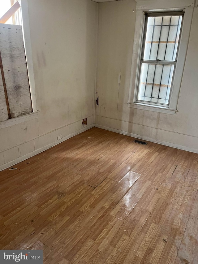 3601 9th St, Baltimore, MD 21225 - unfurnished room featuring hardwood / wood-style flooring and baseboards