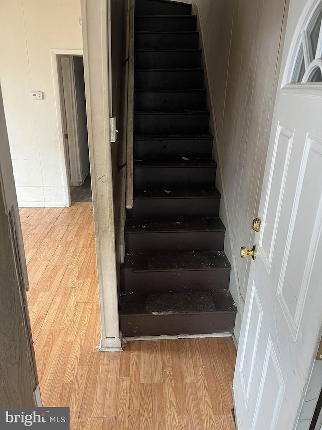 3601 9th St, Baltimore, MD 21225 - stairs featuring wood finished floors