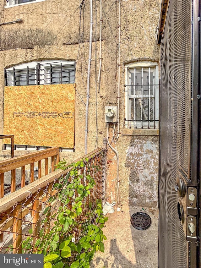 3601 9th St, Baltimore, MD 21225 - view of property exterior with stucco siding