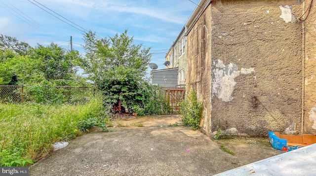 3601 9th St, Baltimore, MD 21225 - view of home's exterior featuring a patio