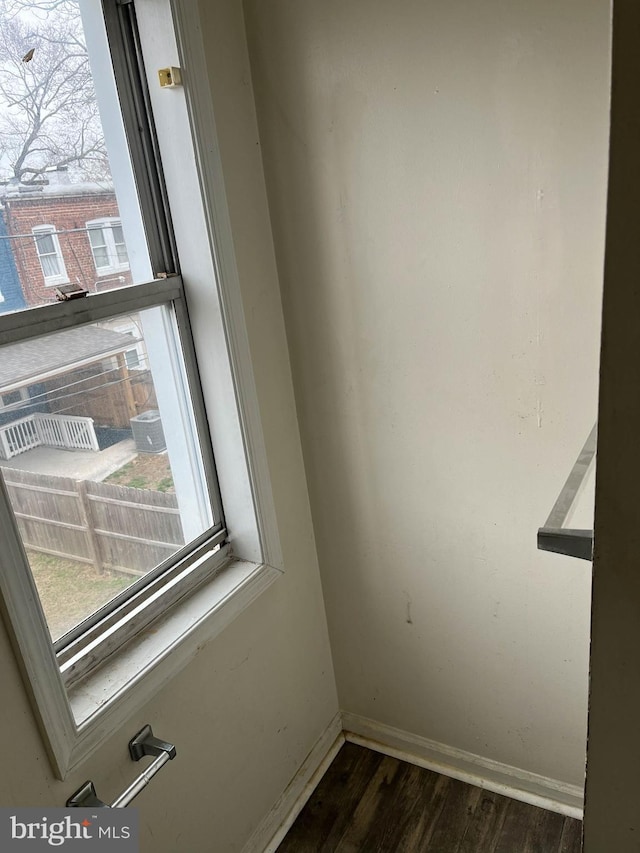 3601 9th St, Baltimore, MD 21225 - spare room with wood finished floors and plenty of natural light