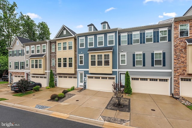 1210 Hickory Hill Cir, Arnold, MD 21012 - townhome / multi-family property featuring an attached garage and driveway