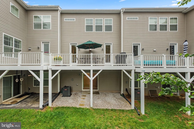 1210 Hickory Hill Cir, Arnold, MD 21012 - rear view of house with a patio area, a lawn, and a deck