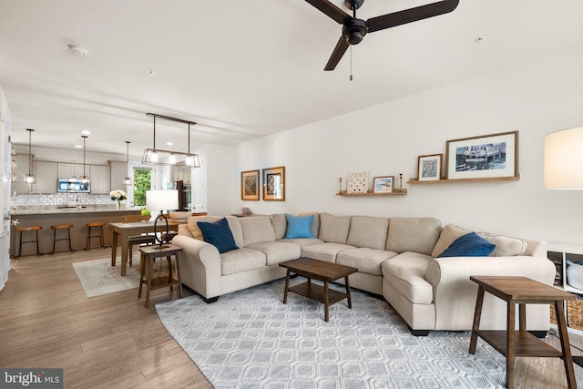 1210 Hickory Hill Cir, Arnold, MD 21012 - living area featuring light wood-style floors and a ceiling fan