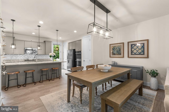 1210 Hickory Hill Cir, Arnold, MD 21012 - dining area featuring light wood-style flooring and recessed lighting