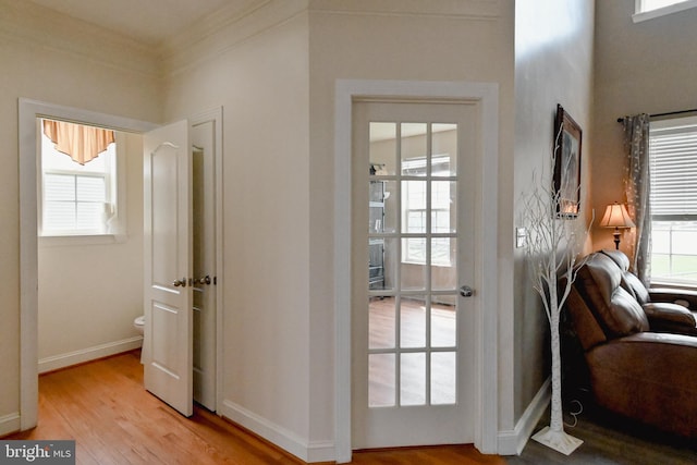 223 Fitzgerald St, Gerrardstown, WV 25420 - doorway featuring light wood-style flooring and crown molding