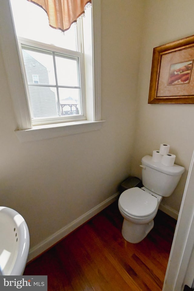 223 Fitzgerald St, Gerrardstown, WV 25420 - bathroom featuring baseboards and wood finished floors
