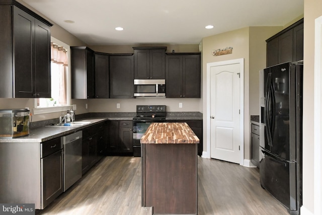 223 Fitzgerald St, Gerrardstown, WV 25420 - kitchen featuring black appliances, wood finished floors, a center island, butcher block countertops, and recessed lighting