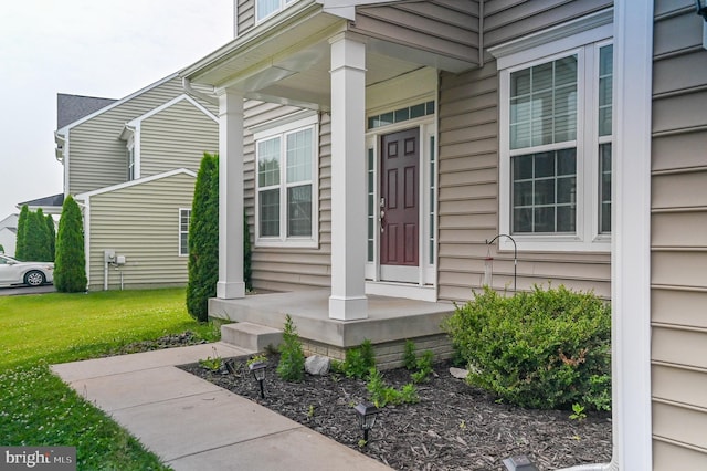 223 Fitzgerald St, Gerrardstown, WV 25420 - doorway to property with a porch and a lawn