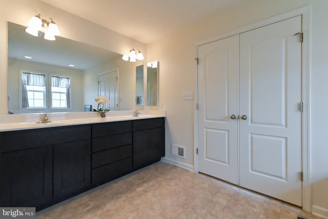 223 Fitzgerald St, Gerrardstown, WV 25420 - full bathroom with double vanity and baseboards