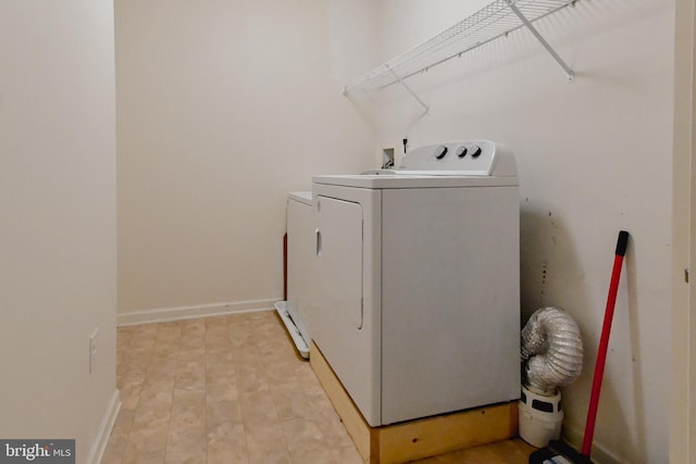 223 Fitzgerald St, Gerrardstown, WV 25420 - laundry area featuring separate washer and dryer and baseboards