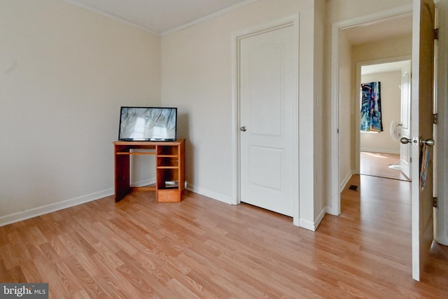 223 Fitzgerald St, Gerrardstown, WV 25420 - unfurnished bedroom featuring light wood-style floors and crown molding