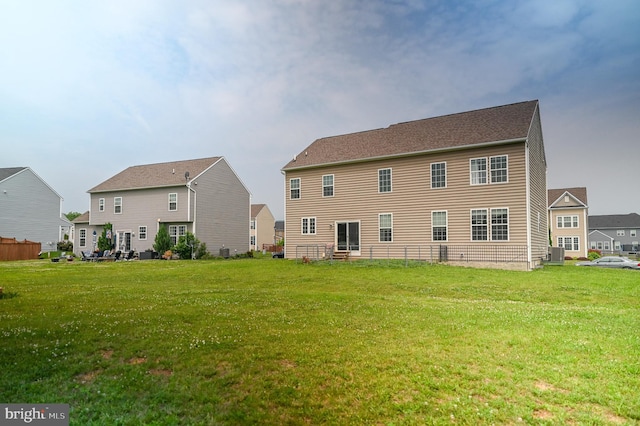 223 Fitzgerald St, Gerrardstown, WV 25420 - rear view of house featuring a lawn