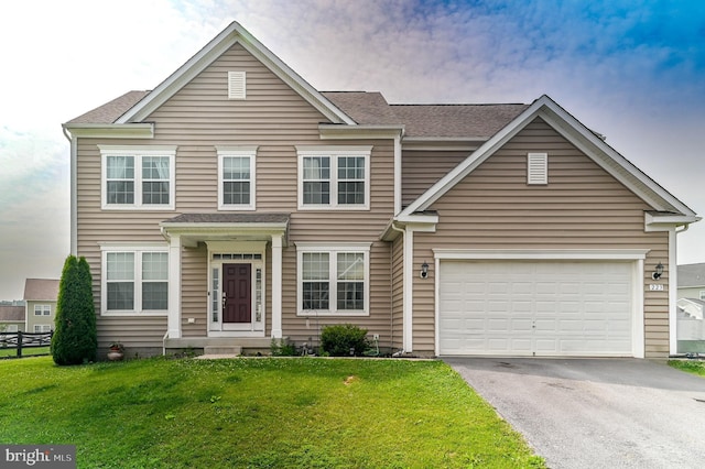 223 Fitzgerald St, Gerrardstown, WV 25420 - view of front facade with asphalt driveway, a garage, and roof with shingles