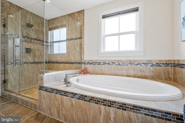 22416 Philanthropic Dr, Ashburn, VA 20148 - bathroom featuring a bath and a stall shower