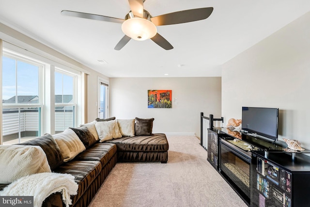 22416 Philanthropic Dr, Ashburn, VA 20148 - living room with light colored carpet and a ceiling fan
