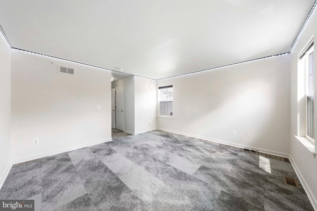 94 Passaic St, Trenton, NJ 08618 - carpeted spare room with baseboards