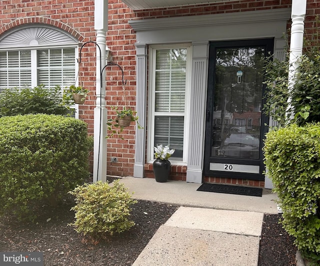 20 Versailles Ct, Hamilton, NJ 08619 - property entrance featuring brick siding