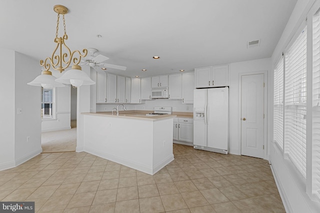 12824 Clarksburg Square Rd Unit 406, Clarksburg, MD 20871 - kitchen featuring white appliances, plenty of natural light, white cabinetry, and recessed lighting