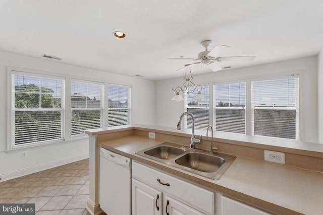 12824 Clarksburg Square Rd Unit 406, Clarksburg, MD 20871 - kitchen with white dishwasher, healthy amount of natural light, white cabinets, a ceiling fan, and recessed lighting