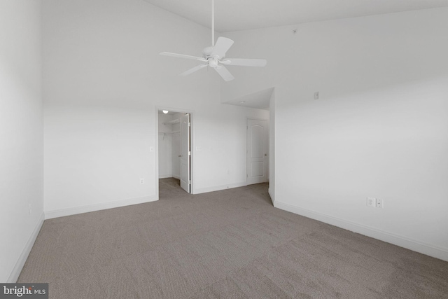 12824 Clarksburg Square Rd Unit 406, Clarksburg, MD 20871 - unfurnished bedroom featuring carpet flooring, high vaulted ceiling, a walk in closet, ceiling fan, and a closet