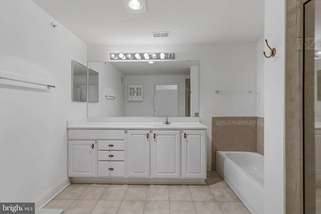 12824 Clarksburg Square Rd Unit 406, Clarksburg, MD 20871 - full bath featuring vanity, a garden tub, tile patterned floors, and a tile shower