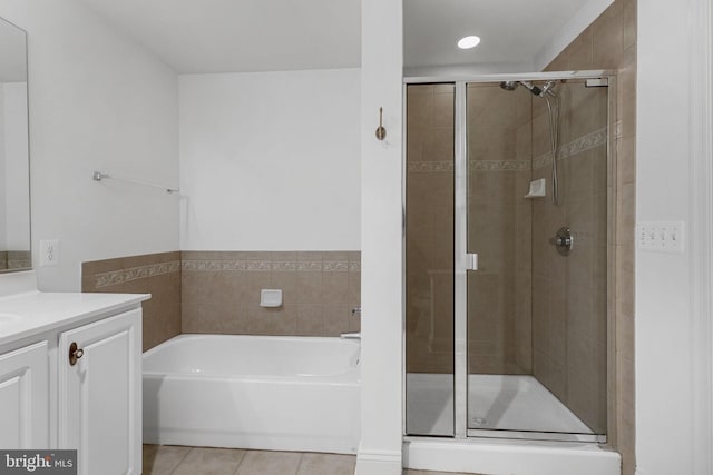 12824 Clarksburg Square Rd Unit 406, Clarksburg, MD 20871 - full bathroom featuring vanity, a garden tub, a shower stall, tile patterned floors, and recessed lighting
