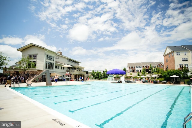 12824 Clarksburg Square Rd Unit 406, Clarksburg, MD 20871 - community pool featuring a water slide