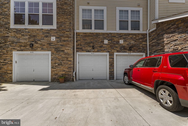 12824 Clarksburg Square Rd Unit 406, Clarksburg, MD 20871 - garage featuring driveway