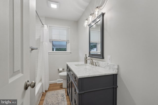 611 Hillcrest Dr, Perkasie, PA 18944 - bathroom featuring vanity, wood finished floors, and shower / bath combination with curtain